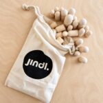 Jindl Canvasbeutel mit einem Teil des Holzfiguren-Sets