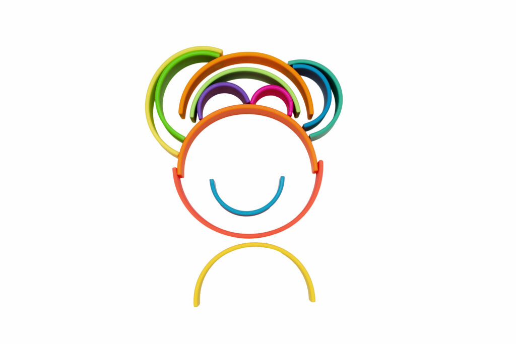 Dëna Regenbogenatmosphäre Neonpuppe 1