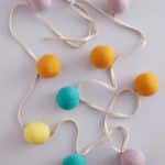 Slinger Kid's Concept pompoms detail