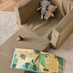 Kinderstoel opvouwbaar Kid's Concept groen uitgerold sfeer